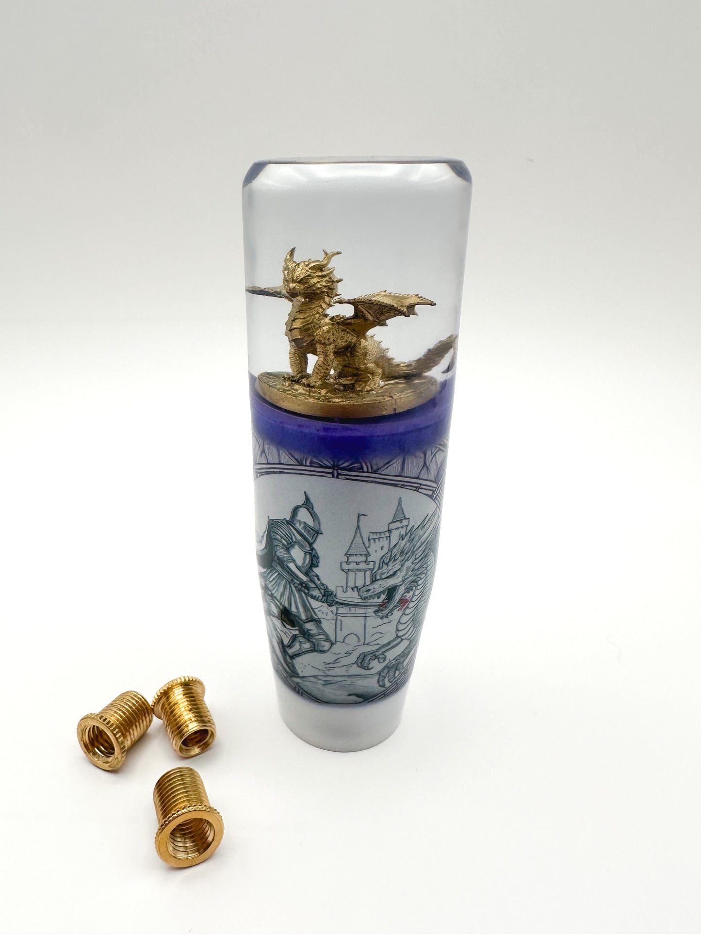 Shop the Golden Dragon Shift Knob with medieval tattoo art design. Weighted resin gear knob fits most manual & automatic vehicles with included adapters for universal fit.