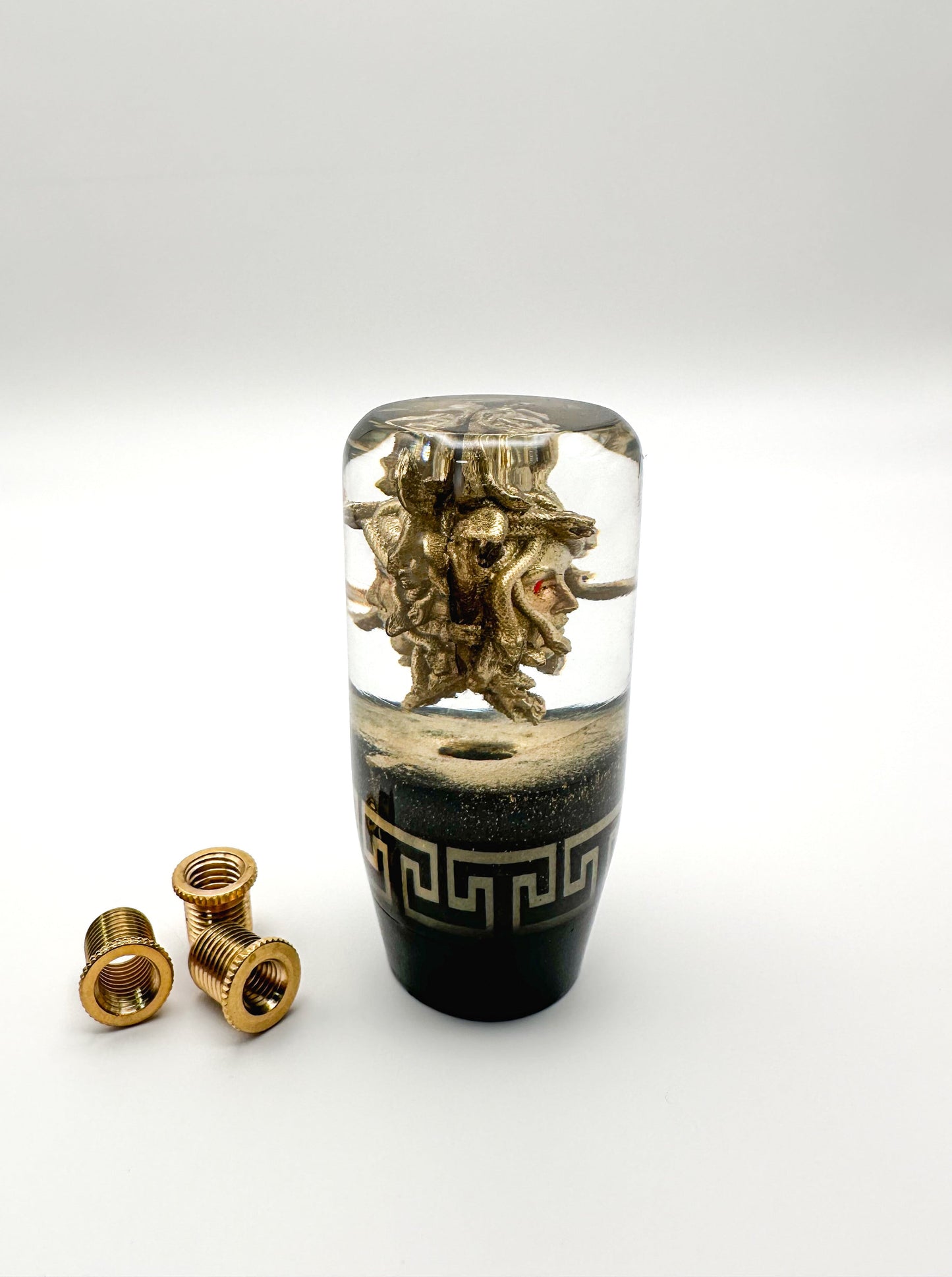 Custom Medusa shift knob sealed in clear resin with Versace-inspired gold detailing. Slightly weighted and fits most manual and automatic cars.