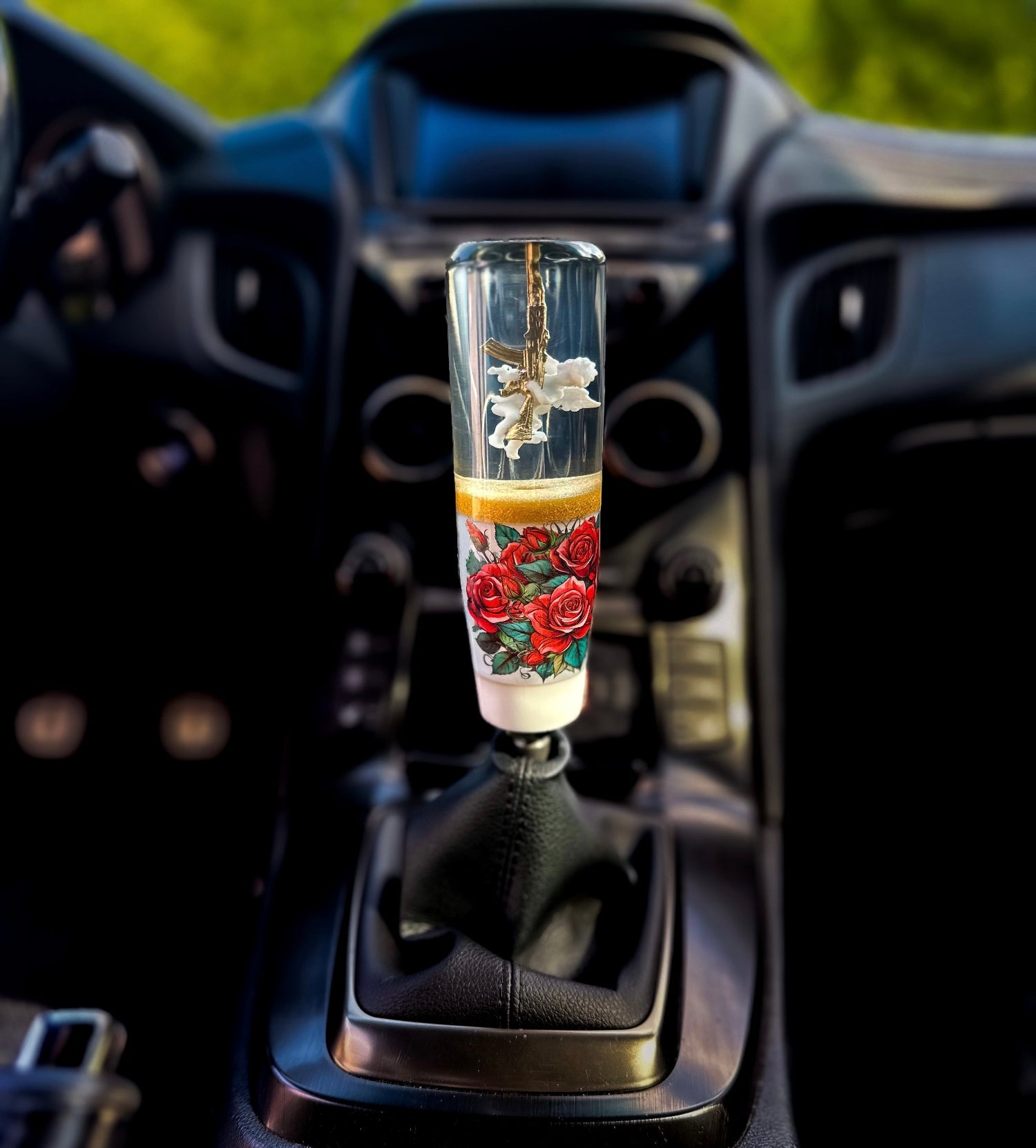 shifter with a Cupid angel and roses holding an gun k 47 shift knob shifter