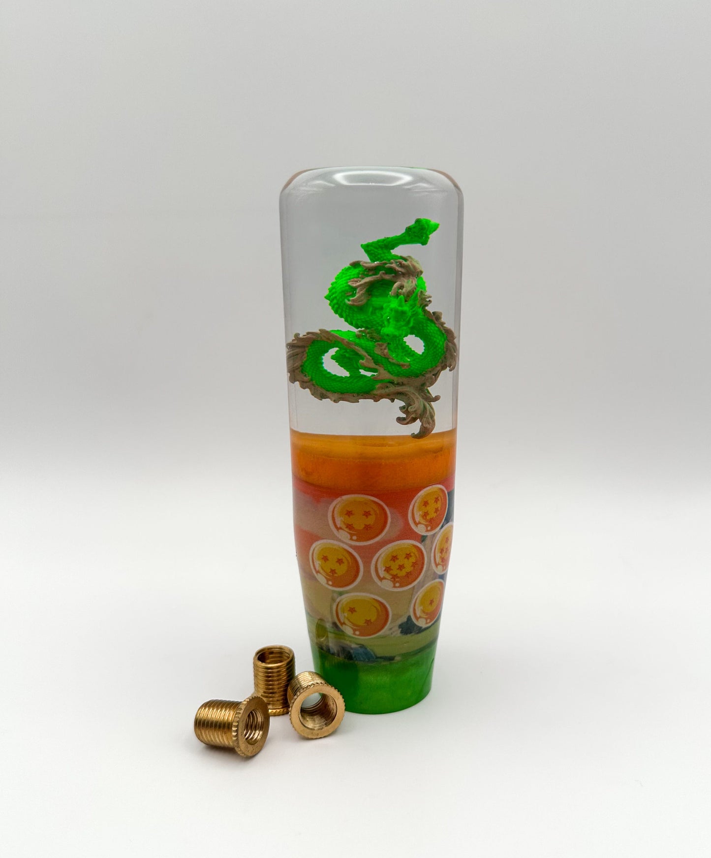 Dragon Ball Z Shenron shift knob with Dragon Balls design. Weighted for smooth shifting. Universal fit for most manual & automatic vehicles.