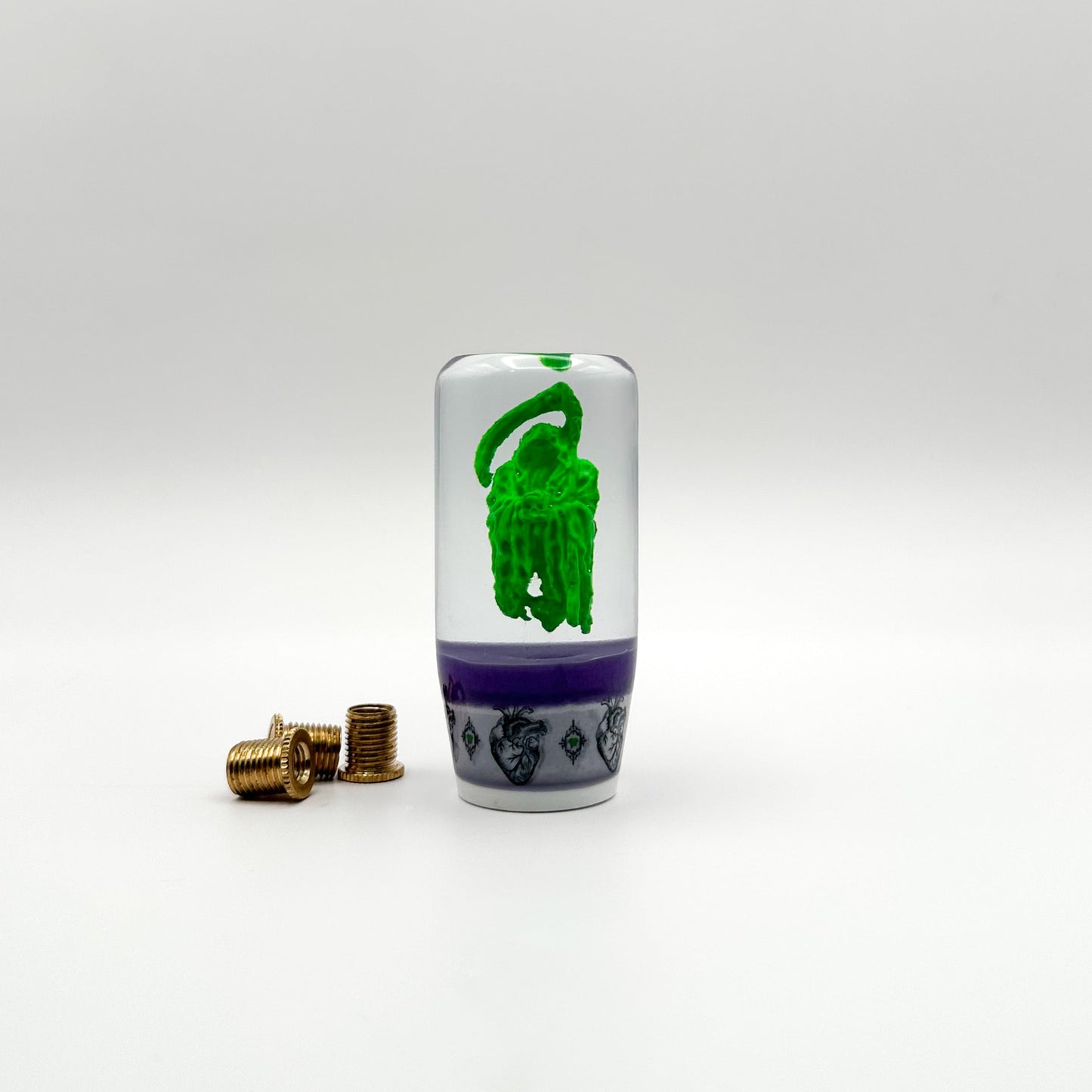 Glow-in-the-dark Grim Reaper shift knob made from premium resin. Weighted, UV-reactive, and universally compatible for manual and automatic cars.