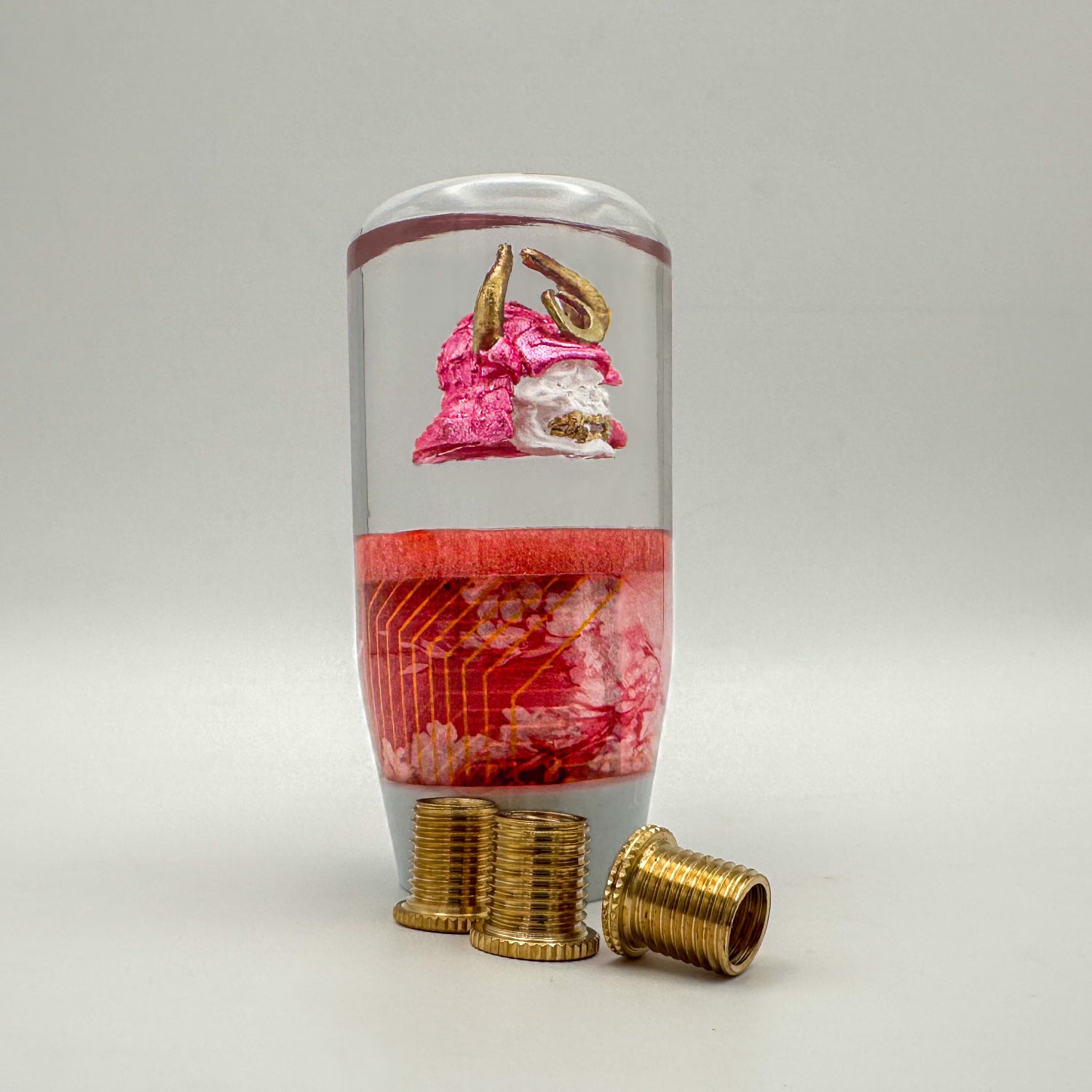 Cyberpunk Oni Samurai Shift Knob – custom resin gear shift with pink helmet, gold horns, and handcrafted Japanese demon detail.