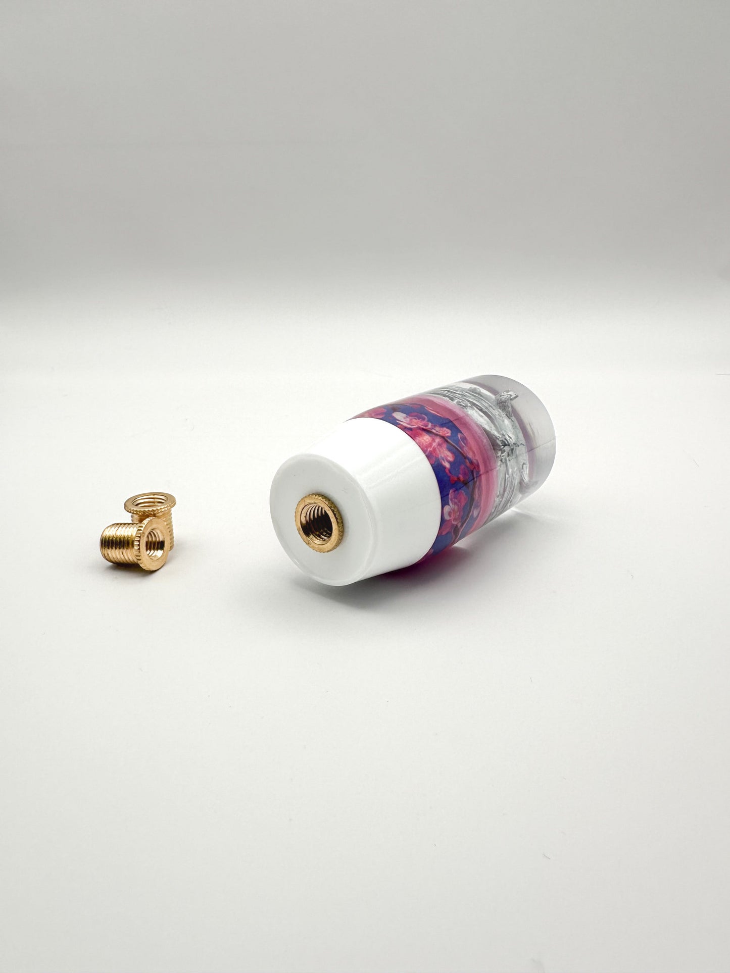 bottom of shift knob showing threads with reducer bushing installed. 