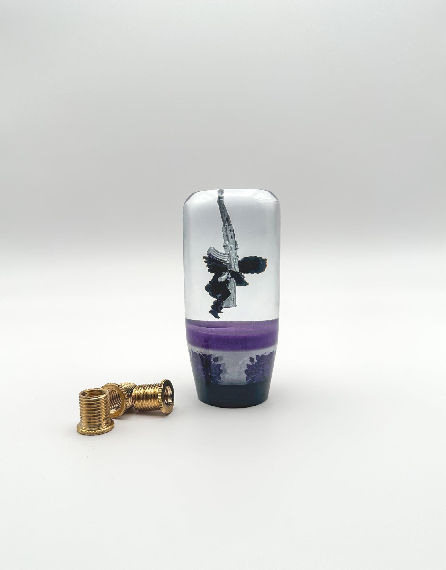 Upgrade your car with the Cupid with AK-47 resin shift knob. Durable, weighted, and crafted with crystal-clear resin, this unique gear shift knob fits most manual and automatic vehicles. Perfect for drivers who want bold style and smooth shifting.