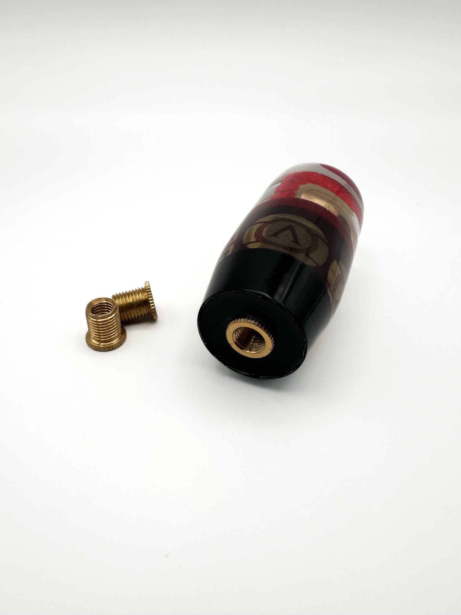 Custom Spartan helmet shift knob in resin with Greek detailing. Slightly weighted for smooth shifts. Fits most manual and automatic cars. Built in the USA.