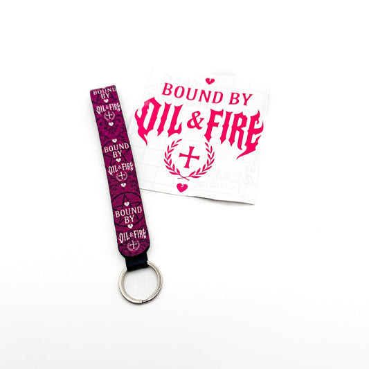 For the heartbreaker who leaves tire marks and shattered souls — the Broken Hearts Edition brings a softer color with just as much bite. This pink shorter-style lanyard keychain and matching heavy-metal font vinyl decal keep the same cult-worthy pentagram details, but with a heartbreak twist.