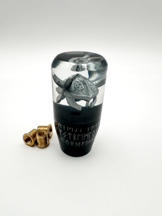 viking shift knob featuring a silver horned helmet and white and black norse rune pattern. a universal stick shifter made in usa. 