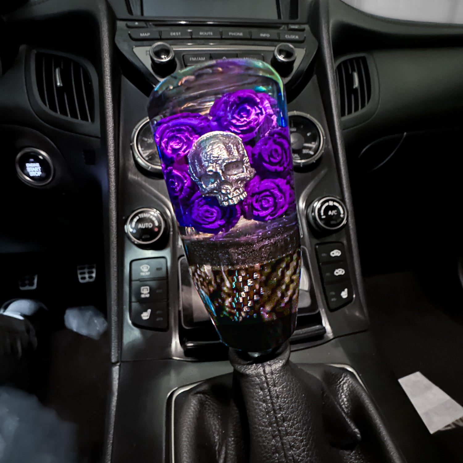 skull and roses shift knob with custom carbon fiber for manual cars