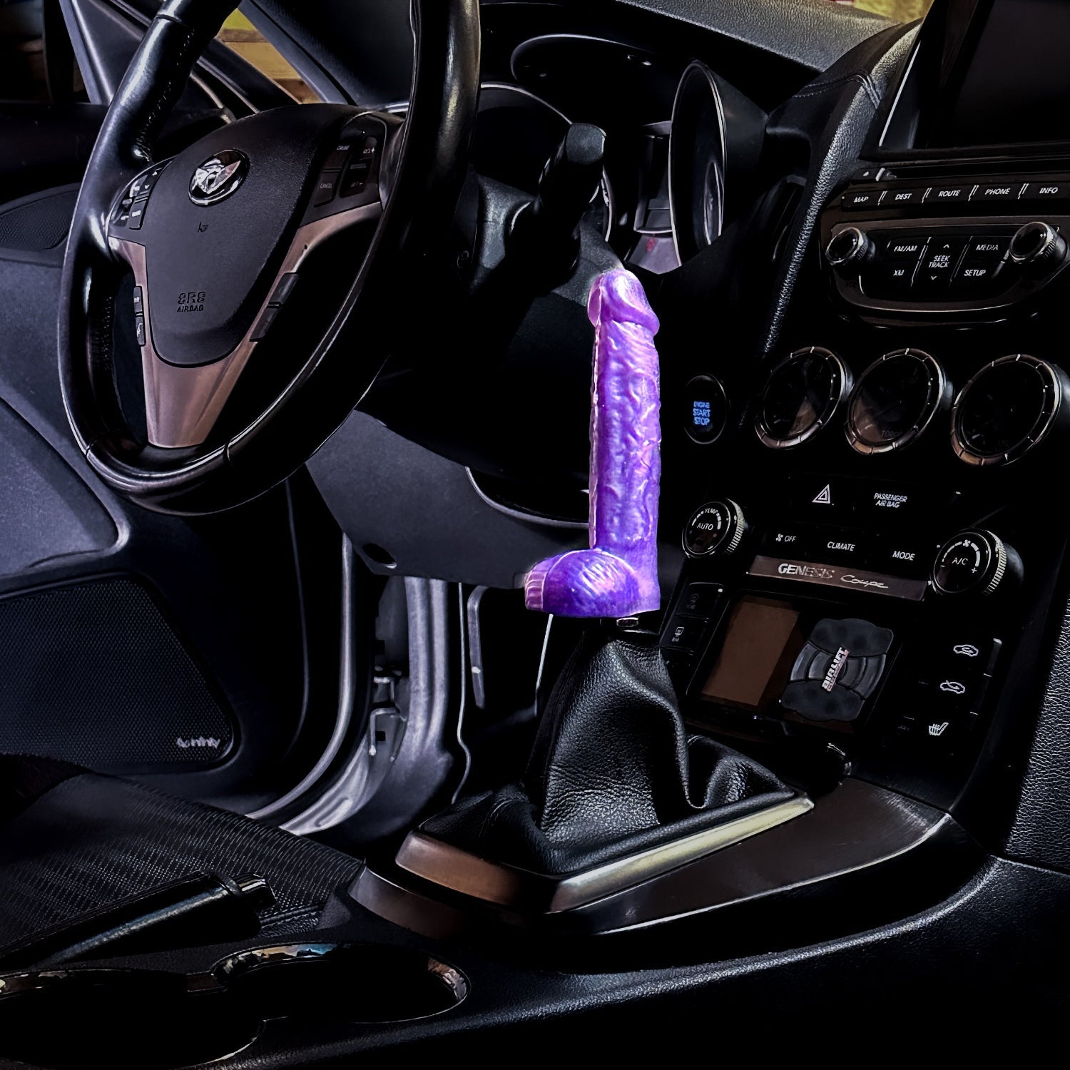 a dildo and penis shaped shift knob for manual stick gear cars, perfect for a joke or gag gift