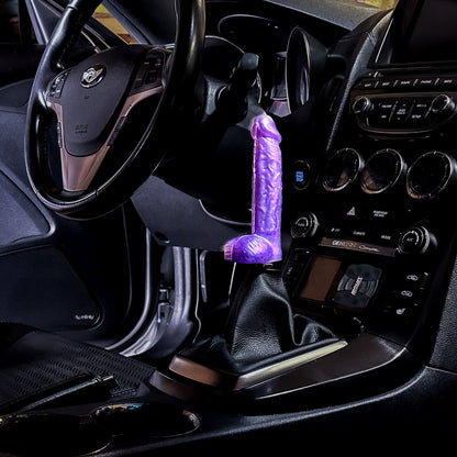 a dildo and penis shaped shift knob for manual stick gear cars, perfect for a joke or gag gift