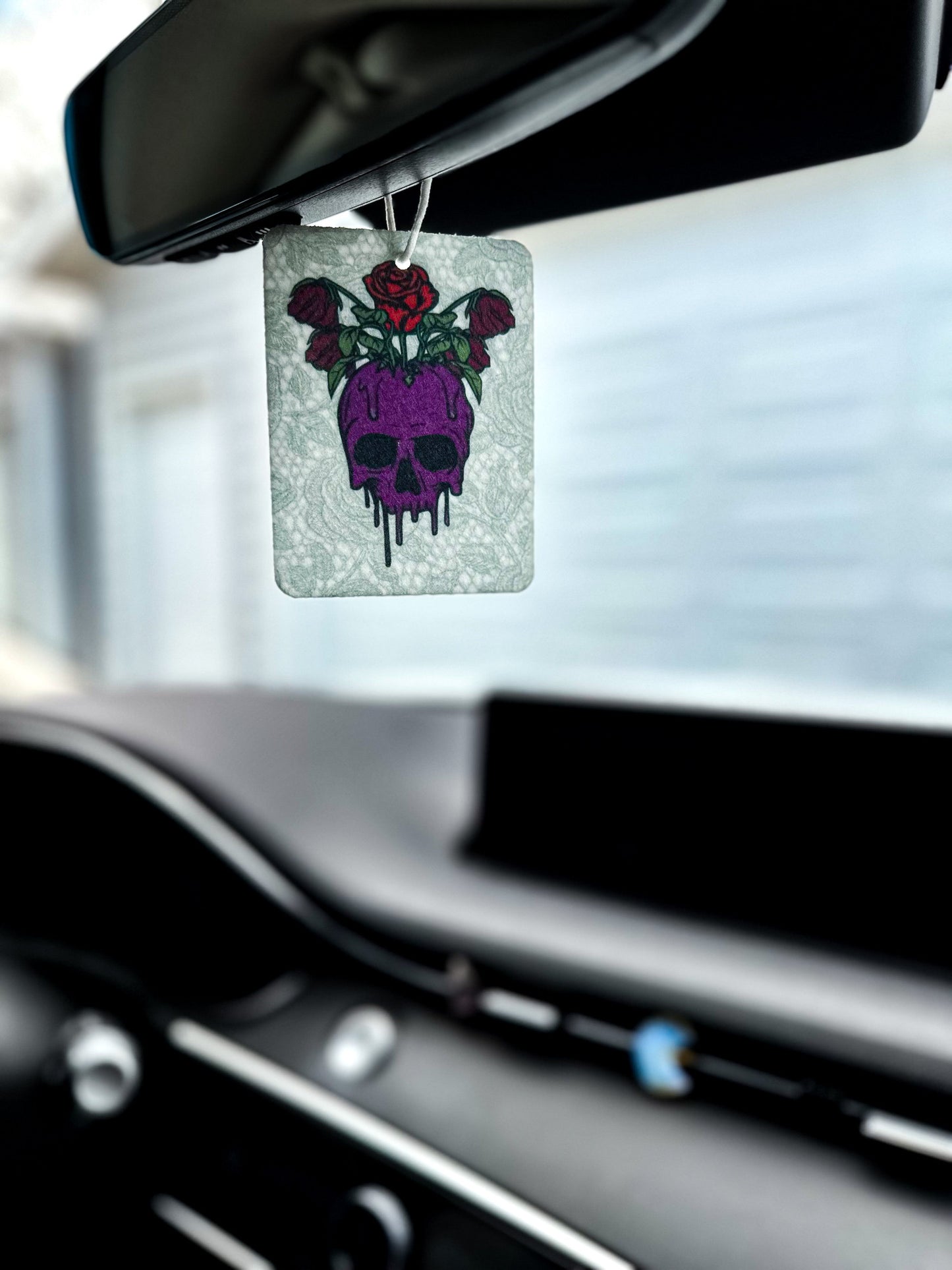 goth girl drip skull air freshener hanging in car