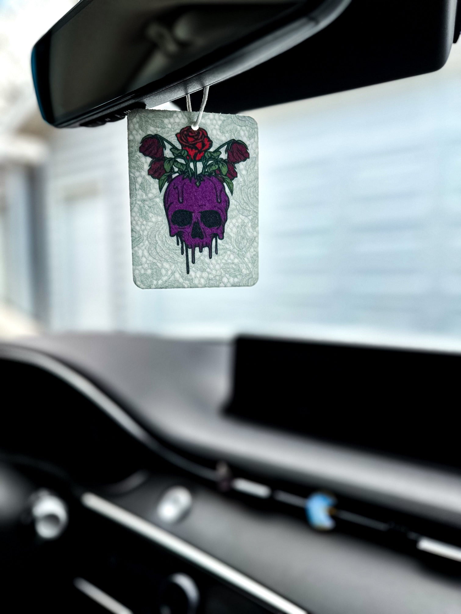 goth girl drip skull air freshener hanging in car