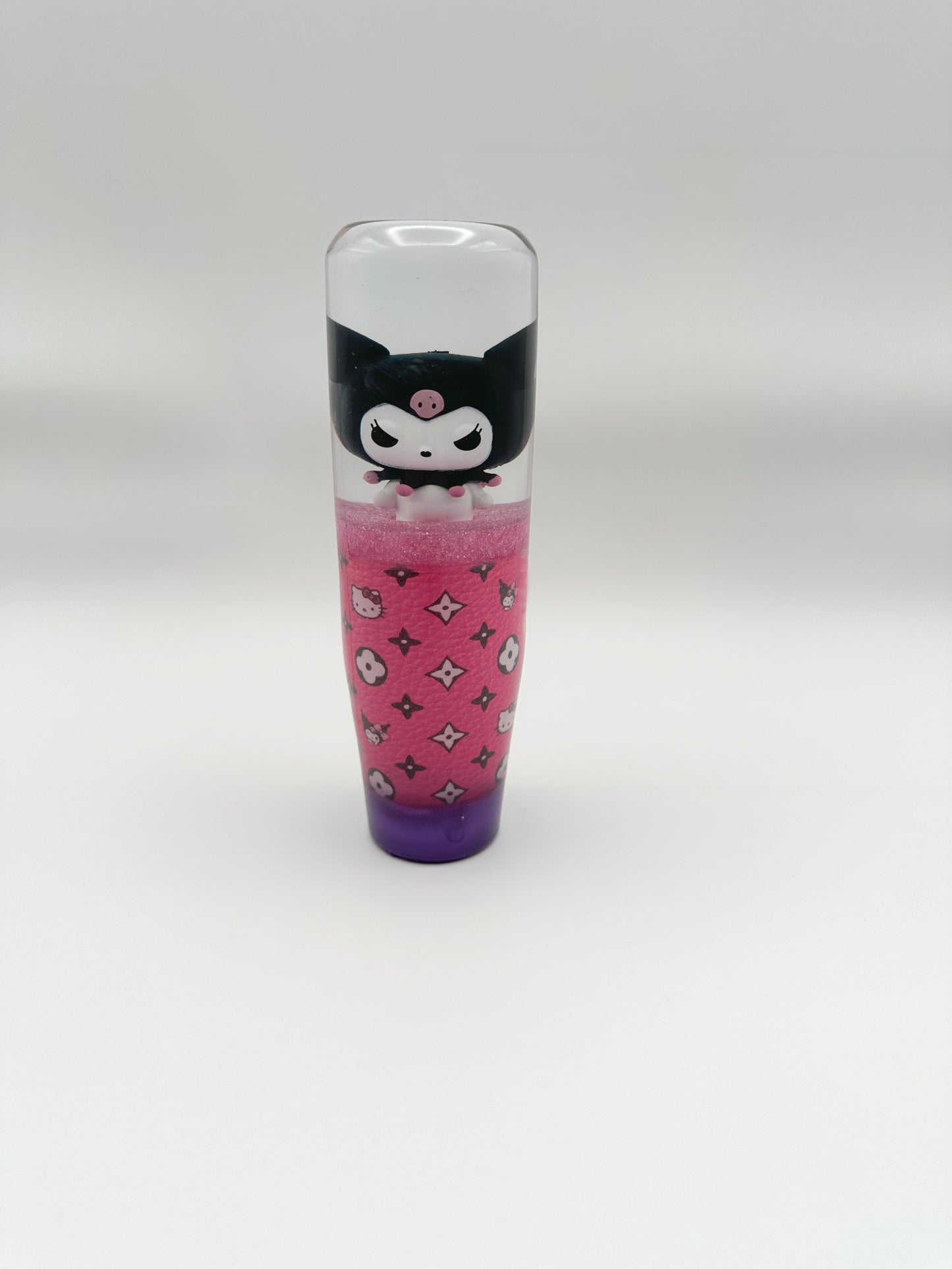 
Upgrade your car interior with the Kuromi x Hello Kitty resin shift knob. Lightweight, durable, and compatible with most manual and automatic transmissions. Perfect for Sanrio fans and car enthusiasts!