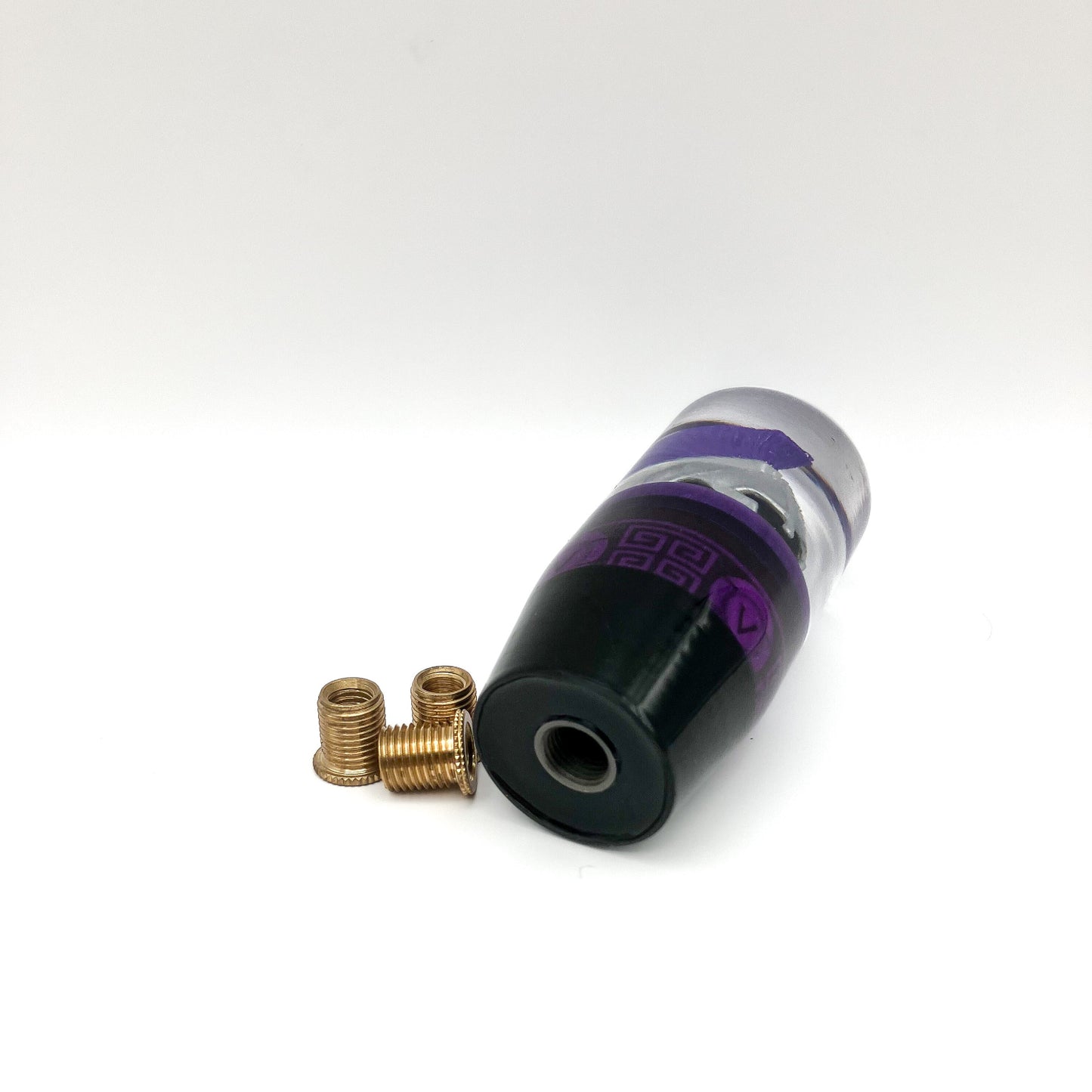 A purple and silver shift knob with a Roman, Greek, spartan helmet with a purple plume. Great for manual or automatic gear Shifters.