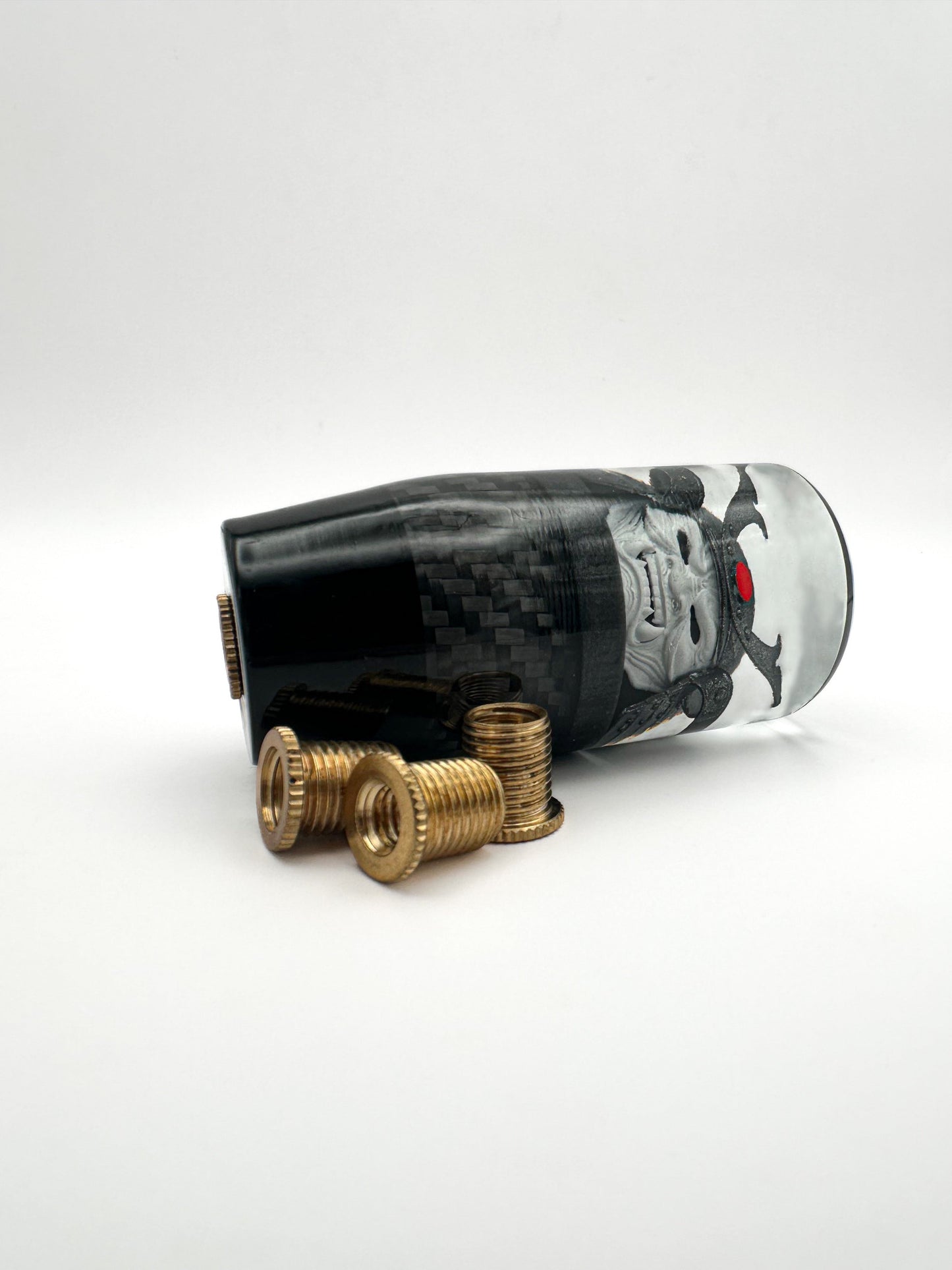 oni samurai shift knob, white face, gunmetal helmet, red accent. features real carbon fiber and black base. 