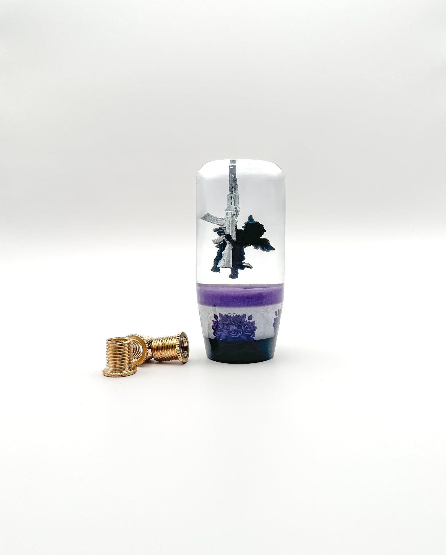 Upgrade your car with the Cupid with AK-47 resin shift knob. Durable, weighted, and crafted with crystal-clear resin, this unique gear shift knob fits most manual and automatic vehicles. Perfect for drivers who want bold style and smooth shifting.