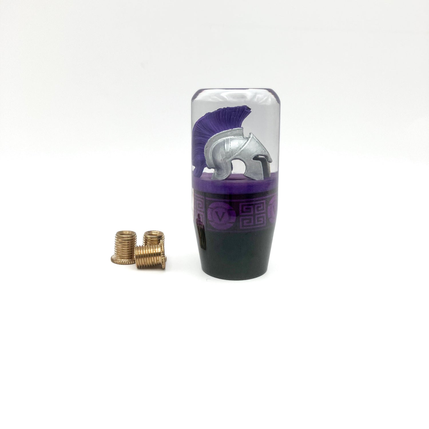 A purple and silver shift knob with a Roman, Greek, spartan helmet with a purple plume. Great for manual or automatic gear Shifters.