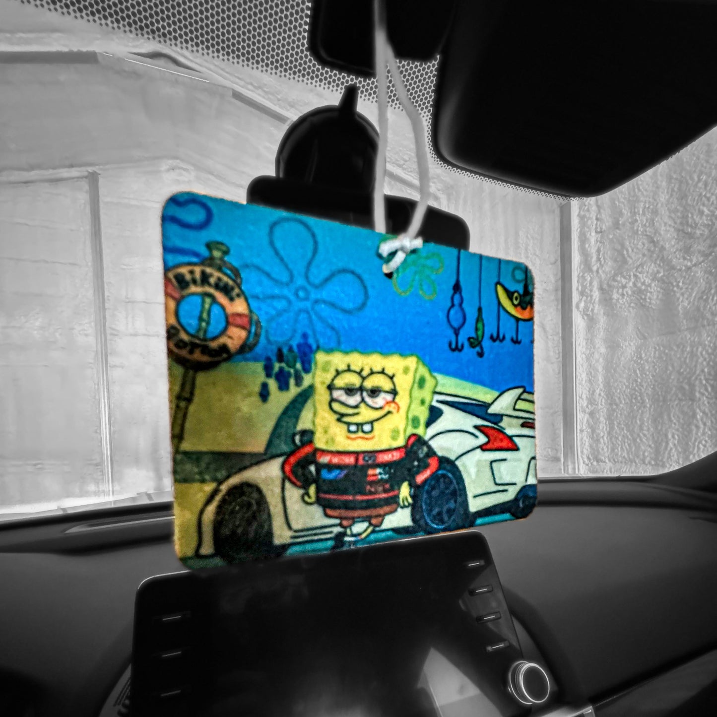 sponge bob in bikini bottom with a manual race car gift air freshener